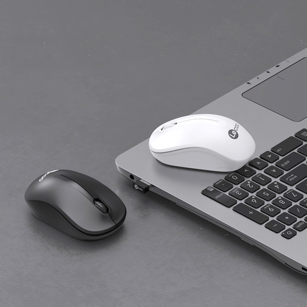 Hand resting on the Lecoo wireless mouse, showing ergonomic design